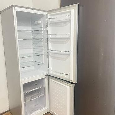 где купить дешевле холодильник: Холодильник Artel, Б/у, Двухкамерный — 4