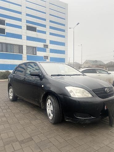 тайота карола 1 3: Toyota Corolla: 2003 г., 1.4 л, Механика, Газ, Хэтчбэк — 7