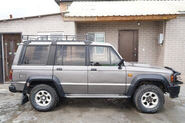 диска семерка: Isuzu Trooper: 1991 г., 2.8 л, Механика, Дизель, Внедорожник — 17