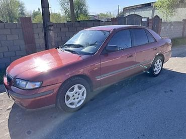 ун басандаткыч: Mazda 626: 1998 г., 1.8 л, Кол менен иштөөчү, Бензин, Седан — 2