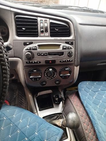 выхлопа: Nissan Primera: 2000 г., 0.2 л, Ручные, Бензин, Седан — 7