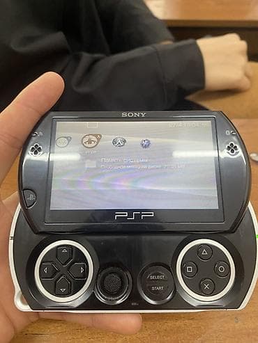 ps camera: Sony PSP Go (N1000) — портативная игровая консоль с выдвижным — 4