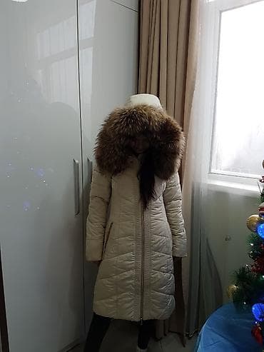 Брала в дордой плазе за 12000 мех натуральный, шикарный пуховик