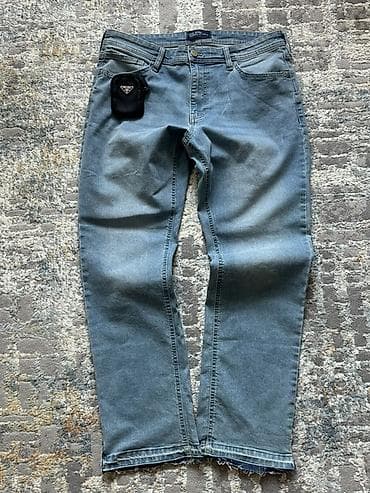 клеш штаны: Джинсы мужские из денима светло‑голубого оттенка.Flared jeans — 1