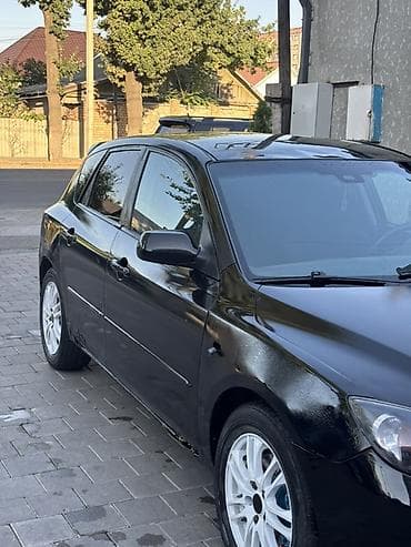 Mazda 3: 2006 г., Хэтчбэк — 7