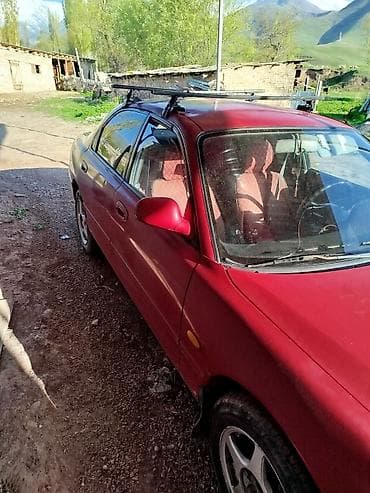 кирг шёлк: Mazda 323: 1995 г., Седан — 2