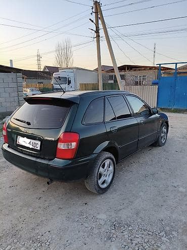 дайхатсу фероза: Mazda 323: 2000 г., 1.6 л, Механика, Бензин, Универсал — 4