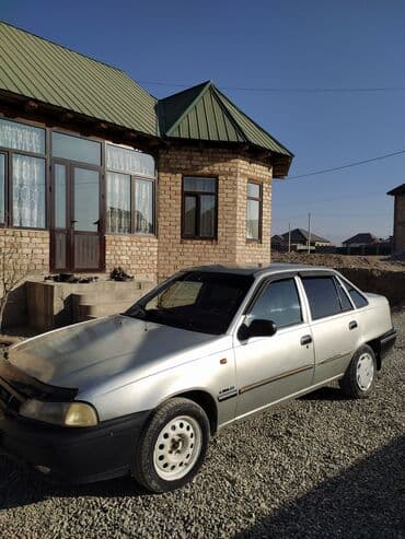 диск на некси: Daewoo Nexia: 2006 г., 1.5 л, Механика, Газ, Седан — 5