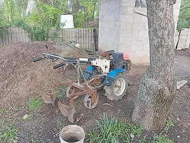 пресподборщик туккан: Мотоблок с навесным оборудованием Описание: - Бензиновый мотоблок — 7
