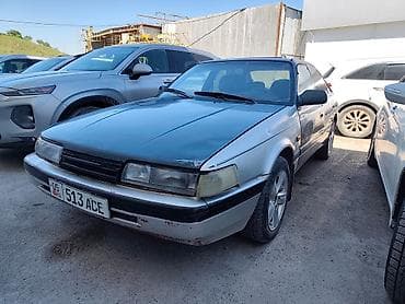 Mazda 626: 1991 г., 2 л, Механика, Бензин, Седан