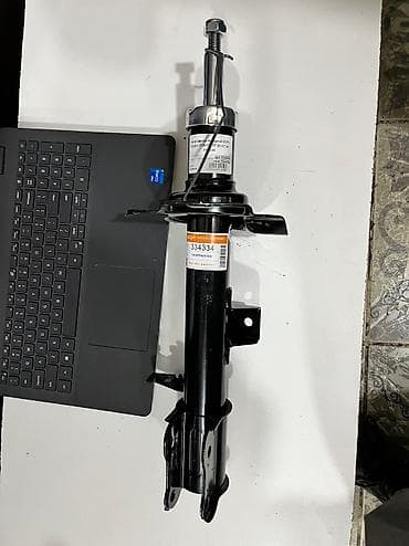 mazda: Передний амортизатор Mazda 2007 г., Новый — 2