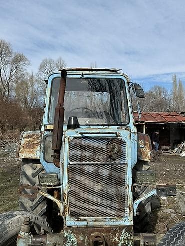 Тракторы ХТЗ: Трактор колесный с кабиной, класс тяги примерно 1,4–2,0 (типовая — 2