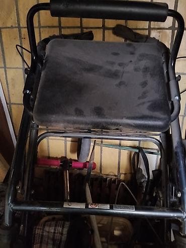 Инвалидная коляска с ручными приводными ободами. Особенности и