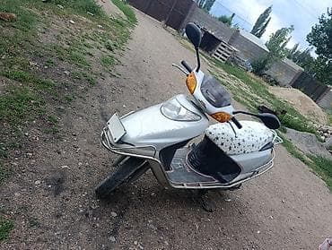 мото тур эндуро: Скутер Honda Dio (серия AF) серебристого цвета. бензин - Компактный — 1