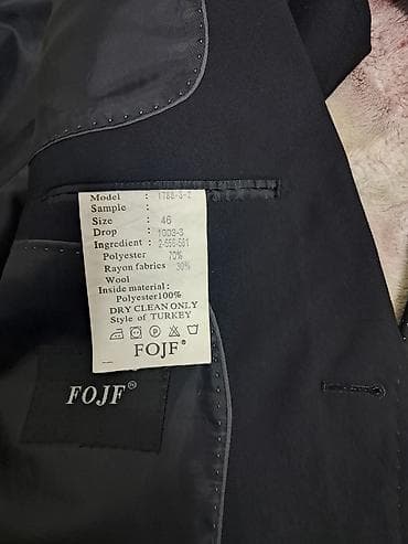 национальный платя: Всё за 3000 Состав: - Костюм-двойка темно-синего/черного цвета — 2