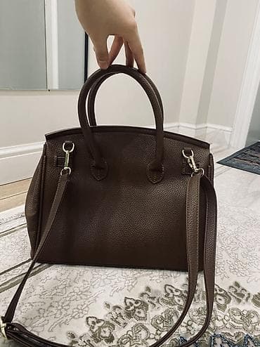 secret key: Сумка-эрмес из фактурной коричневой кожи с золотистой фурнитурой. - — 1