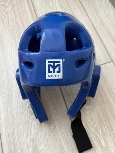 Шлем для тхэквондо Moote синего цвета с открытым лицом. Модель