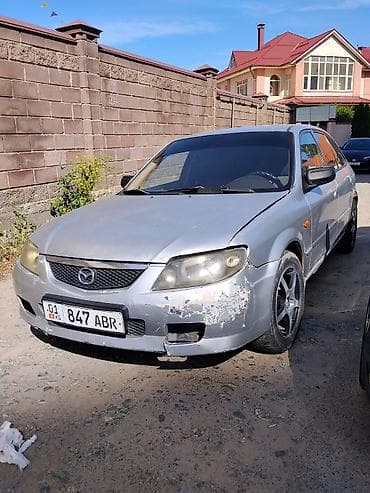 чехол 13 pro: Mazda 323: 2002 г., Механика, Бензин, Хэтчбэк — 2