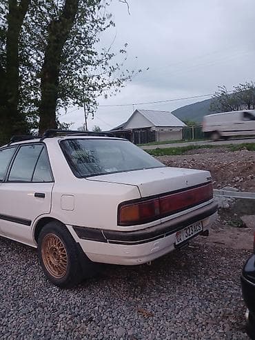 лобовое стекло мазда: Mazda 323: 1989 г., Седан — 3