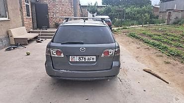 audi a8 d2: Mazda 6: 2005 г., Механика, Универсал — 7