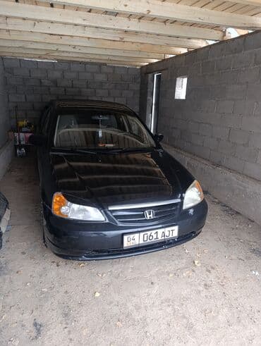 авто прикуриватель: Honda Civic: 2003 г., 1.7 л, Автомат, Бензин, Седан — 7