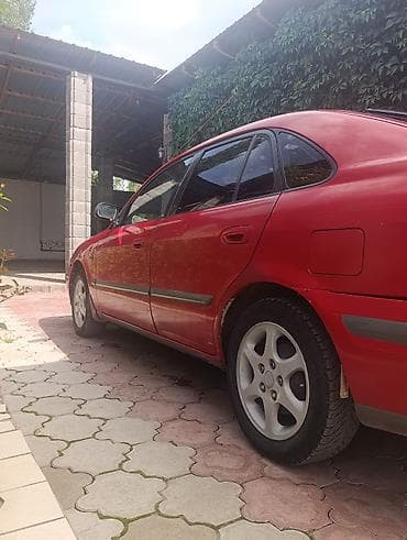 бампер на демио: Mazda 626: 1998 г., 2 л, Механика, Бензин, Лифтбек — 2