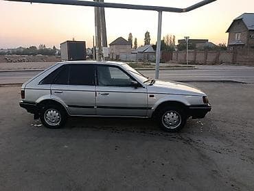 уаз hunter: Mazda 323: 1985 г., 1.5 л, Механика, Бензин, Хэтчбэк — 6
