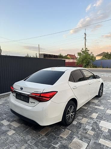 Toyota Corolla: 2016 г., 1.8 л, Автомат, Гибрид, Седан — 5