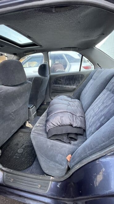 срочно в связи с переездом: Mitsubishi Lancer: 1996 г., 1.3 л, Механика, Бензин, Седан — 10