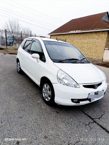 ход: Honda Fit (правый руль), салон и оснащение - Руль справа — 8