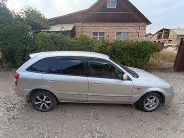 опел зафира б: Mazda 323: 2001 г., 1.6 л, Механика, Бензин, Хэтчбэк — 5