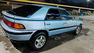 сг 9: Mazda 323: 1994 г., 1.6 л, Механика, Бензин, Лифтбек — 3
