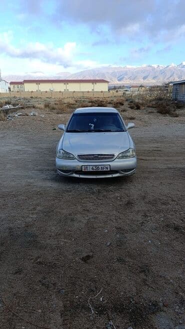 домкрат 5 тон: Kia Clarus: 1998 г., 1.8 л, Механика, Бензин, Седан — 6