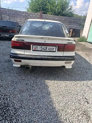 Транспорт: Mitsubishi Lancer: 1990 г., 1.5 л, Механика, Бензин, Седан — 3