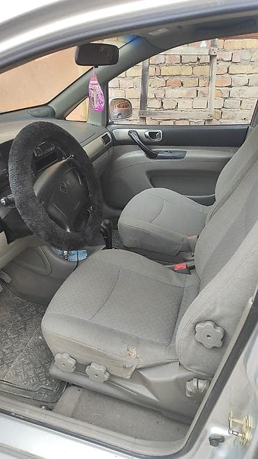 коврик на авто: Daewoo Tacuma: 2004 г., 2 л, Автомат, Бензин, Минивэн — 4
