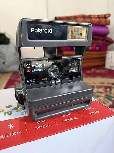 Polaroid OneStep CloseUp — классическая моментальная камера для