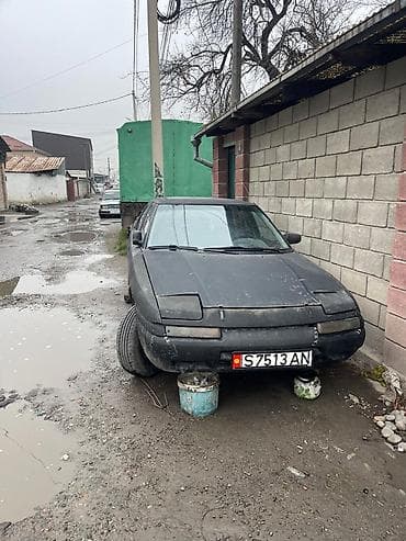 8: Mazda 323: 1991 г., 1.8 л, Механика, Бензин — 3