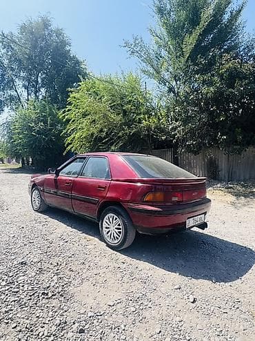 т макс скутер: Mazda 323: 1994 г., 1.6 л, Механика, Бензин, Хэтчбэк — 3