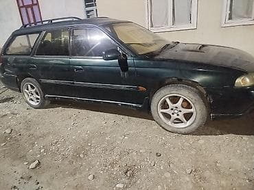 выхлоп sti: Subaru Legacy: 1998 г., Автомат, Универсал — 1