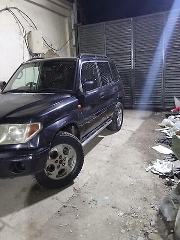 tayota progres: Mitsubishi Pajero iO: 2003 г., Ручные, Бензин, Внедорожник — 2