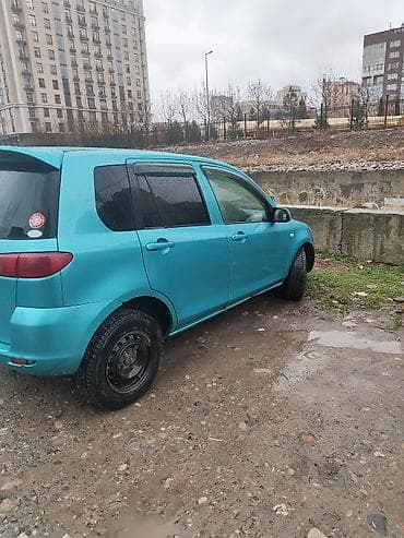 colf 2: Mazda Demio: 2002 г., 1.3 л, Автомат, Бензин, Хэтчбэк — 5