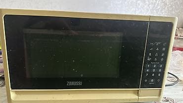 magic mous: Микроволновая печь Zanussi с электронным управлением и панелью — 1