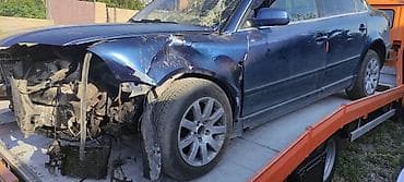 i bus: Volkswagen Passat B5+(седан), тёмно‑синий цвет. Автомобиль после ДТП — 1