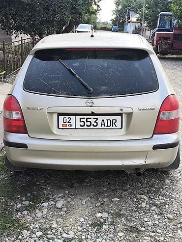byd e2: Mazda 323: 1999 г., Механика, Бензин, Хэтчбэк — 7