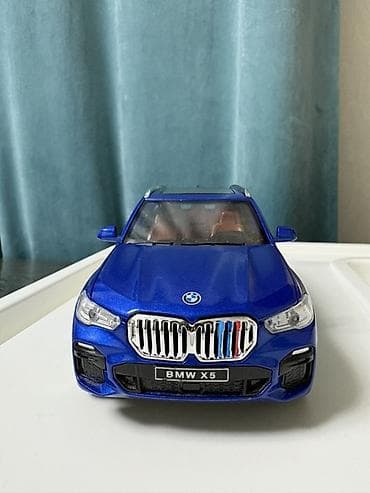 часы tag heuer: Коллекционная модель автомобиля BMW X5 xDrive40i (масштаб — 2