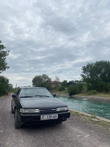 Mazda Capella: 1990 г., 2 л, Механика, Бензин, Седан — 1