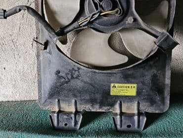 запчасти митсубиси каризма бу: Вентилятор Mitsubishi 1997 г., Б/у, Оригинал, Германия — 5