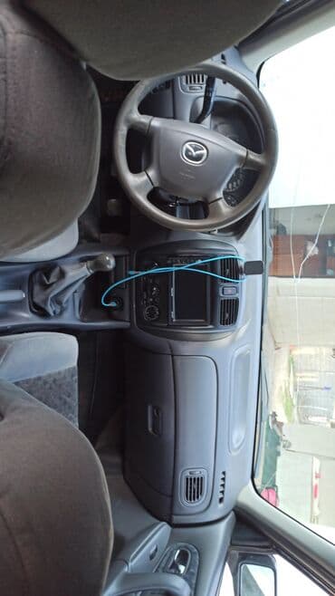 продаю или меняю на дом: Mazda 323: 2000 г., 1.6 л, Механика, Бензиновая, Седан — 5