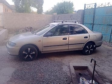 митсубиси спайк стар: Mazda 323: 1996 г., Механика, Бензин, Седан — 3