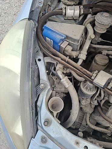 Транспорт: Передняя левая фара Honda 2004 г., Оригинал — 2